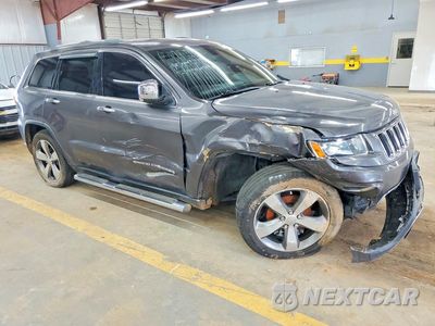 Czwarte zdjęcie samochodu z boku: 2014 JEEP GRAND CHEROKEE LIMITED VIN:1C4RJEBM0EC300290 - miniatura