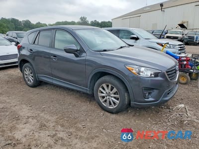 Czwarte zdjęcie samochodu z boku: 2016 MAZDA CX-5 TOURING VIN:JM3KE4CY0G0893775 - miniatura