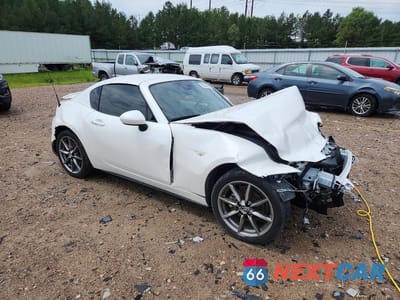 Czwarte zdjęcie samochodu z boku: 2023 MAZDA MX-5 MIATA GRAND TOURING VIN:JM1NDAM72P0559843 - miniatura
