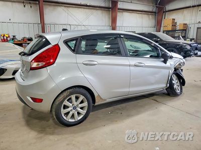 Trzecie zdjęcie samochodu z tyłu: 2012 FORD FIESTA SE VIN:3FADP4EJ6CM104733 - miniatura