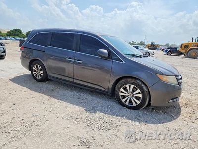 Czwarte zdjęcie samochodu z boku: 2016 HONDA ODYSSEY SE VIN:5FNRL5H32GB037976 - miniatura