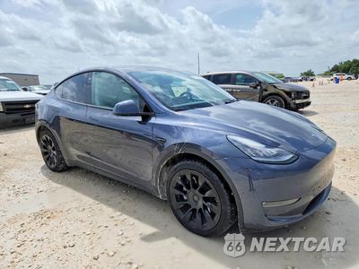 Czwarte zdjęcie samochodu z boku: 2021 TESLA MODEL Y VIN:5YJYGDEE3MF076670 - miniatura