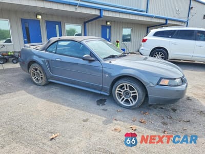 Czwarte zdjęcie samochodu z boku: 2000 FORD MUSTANG VIN:1FAFP4444YF281096 - miniatura