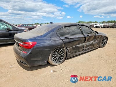 Trzecie zdjęcie samochodu z tyłu: 2017 BMW 740 XI VIN:WBA7E4C57HGU99328 - miniatura