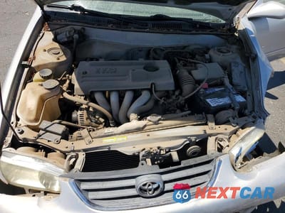 Zdjęcie 11 z 12 samochodu: 2002 TOYOTA COROLLA LE VIN:1NXBR12E22Z584227 - miniatura