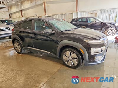 Czwarte zdjęcie samochodu z boku: 2021 HYUNDAI KONA SEL VIN:KM8K23AG6MU131461 - miniatura