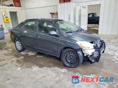 Czwarte zdjęcie samochodu z boku: 2010 TOYOTA YARIS BASE VIN:JTDBT4K33A1357828 - miniatura