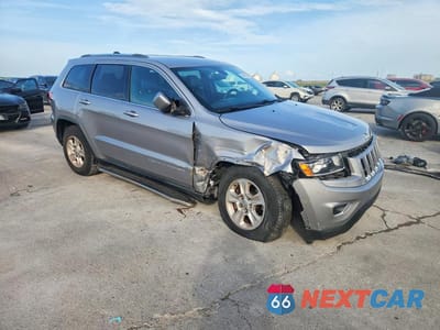 Czwarte zdjęcie samochodu z boku: 2015 JEEP GRAND CHEROKEE LAREDO VIN:1C4RJEAG7FC217579 - miniatura