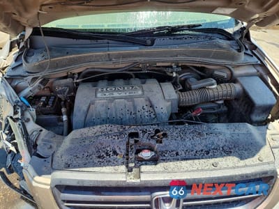 Zdjęcie 12 z 13 samochodu: 2005 HONDA PILOT EX VIN:5FNYF18455B030134 - miniatura