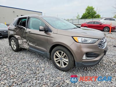 Czwarte zdjęcie samochodu z boku: 2019 FORD EDGE SEL VIN:2FMPK4J96KBC54063 - miniatura