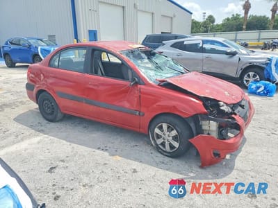 Czwarte zdjęcie samochodu z boku: 2009 KIA RIO BASE VIN:KNADE223896498767 - miniatura