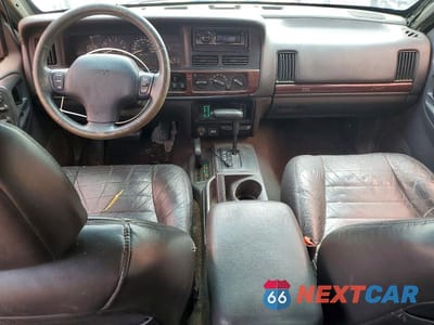 Zdjęcie 8 z 13 samochodu: 1998 JEEP GRAND CHEROKEE LAREDO VIN:1J4GZ58Y2WC157042 - miniatura
