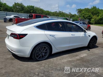 Trzecie zdjęcie samochodu z tyłu: 2018 TESLA MODEL 3 VIN:5YJ3E1EA7JF007505 - miniatura