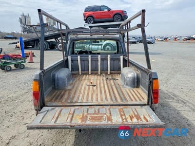 Zdjęcie 10 z 13 samochodu: 1992 NISSAN TRUCK SHORT WHEELBASE VIN:1N6SD11S3NC356819 - miniatura