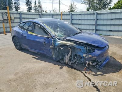 Czwarte zdjęcie samochodu z boku: 2021 TESLA MODEL 3 VIN:5YJ3E1EA0MF061538 - miniatura