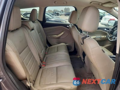 Zdjęcie 11 z 13 samochodu: 2014 FORD ESCAPE TITANIUM VIN:1FMCU9J99EUE52589 - miniatura