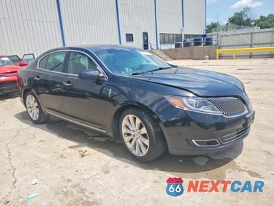 Czwarte zdjęcie samochodu z boku: 2015 LINCOLN MKS VIN:1LNHL9FT0FG600755 - miniatura