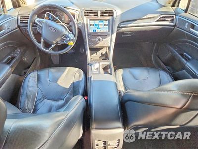 Zdjęcie 8 z 12 samochodu: 2017 FORD FUSION TITANIUM PHEV VIN:3FA6P0SU6HR191642 - miniatura