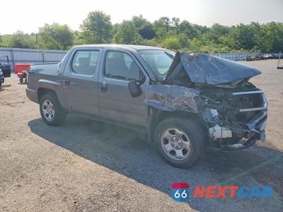 Czwarte zdjęcie samochodu z boku: 2010 HONDA RIDGELINE RT VIN:5FPYK1F24AB005434 - miniatura