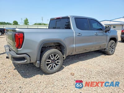 Trzecie zdjęcie samochodu z tyłu: 2021 GMC SIERRA K1500 AT4 VIN:1GTU9EET1MZ174104 - miniatura
