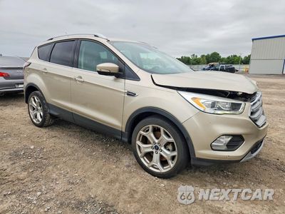 Czwarte zdjęcie samochodu z boku: 2017 FORD ESCAPE TITANIUM VIN:1FMCU0J90HUB86055 - miniatura
