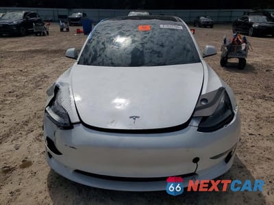 Piąte zdjęcie samochodu w środku: 2023 TESLA MODEL 3 VIN:5YJ3E1EA1PF513209 - miniatura