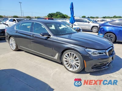 Czwarte zdjęcie samochodu z boku: 2017 BMW 750 I VIN:WBA7F0C35HGM21585 - miniatura