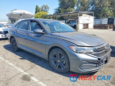 Czwarte zdjęcie samochodu z boku: 2022 VOLKSWAGEN JETTA SE VIN:3VW7M7BU0NM005454 - miniatura