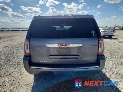 Zdjęcie 6 z 13 samochodu: 2018 GMC YUKON XL DENALI VIN:1GKS2HKJXJR198689 - miniatura