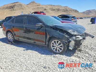 Czwarte zdjęcie samochodu z boku: 2011 VOLKSWAGEN JETTA SE VIN:3VWDZ7AJXBM103964 - miniatura