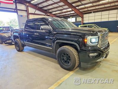 Czwarte zdjęcie samochodu z boku: 2016 GMC SIERRA K1500 DENALI VIN:3GTU2PEJ8GG115912 - miniatura