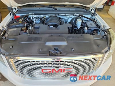 Zdjęcie 12 z 13 samochodu: 2015 GMC YUKON XL K1500 SLE VIN:1GKS2GKC2FR636138 - miniatura