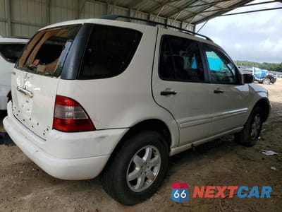 Trzecie zdjęcie samochodu z tyłu: 2003 MERCEDES-BENZ ML 500 VIN:4JGAB75E43A415649 - miniatura