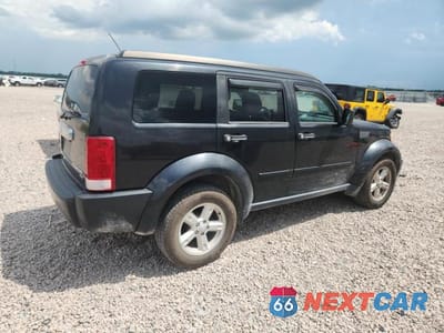 Trzecie zdjęcie samochodu z tyłu: 2010 DODGE NITRO SXT VIN:1D4PT5GK1AW105027 - miniatura