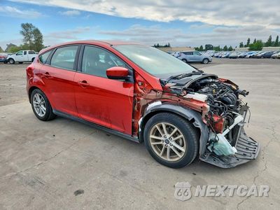 Czwarte zdjęcie samochodu z boku: 2018 FORD FOCUS SE VIN:1FADP3K2XJL244872 - miniatura