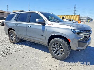 Czwarte zdjęcie samochodu z boku: 2021 CHEVROLET TAHOE K1500 Z71 VIN:1GNSKPKD2MR260601 - miniatura