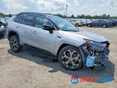 Czwarte zdjęcie samochodu z boku: 2024 TOYOTA RAV4 PRIME XSE VIN:JTMFB3FV0RD233651 - miniatura