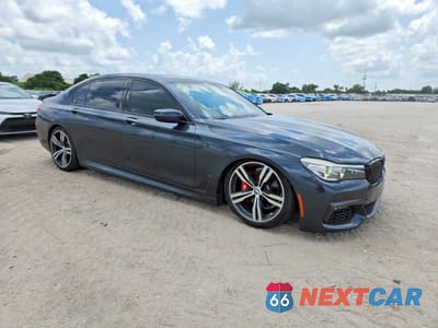 Czwarte zdjęcie samochodu z boku: 2019 BMW 740 I VIN:WBA7E2C56KB217432 - miniatura