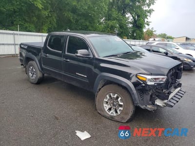 Czwarte zdjęcie samochodu z boku: 2023 TOYOTA TACOMA TRD OFF-ROAD VIN:3TMCZ5AN9PM648969 - miniatura