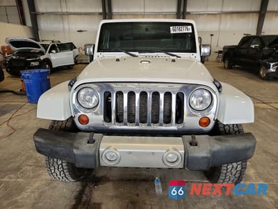 Piąte zdjęcie samochodu w środku: 2012 JEEP WRANGLER SAHARA VIN:1C4AJWBG1CL123761 - miniatura
