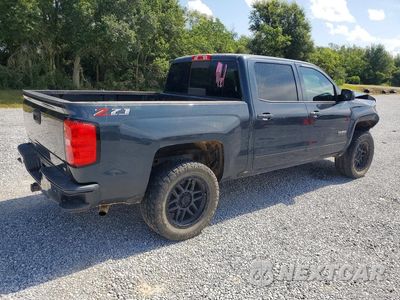 Trzecie zdjęcie samochodu z tyłu: 2018 CHEVROLET SILVERADO K1500 LT VIN:3GCUKREC1JG432063 - miniatura