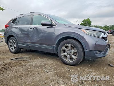 Czwarte zdjęcie samochodu z boku: 2017 HONDA CR-V EXL VIN:2HKRW2H8XHH604181 - miniatura