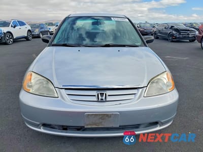 Piąte zdjęcie samochodu w środku: 2002 HONDA CIVIC LX VIN:2HGES16502H607184 - miniatura