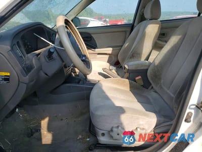 Zdjęcie 7 z 12 samochodu: 2004 HYUNDAI ELANTRA GLS VIN:KMHDN46D94U724901 - miniatura