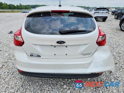 Zdjęcie 6 z 12 samochodu: 2014 FORD FOCUS TITANIUM VIN:1FADP3N27EL439510 - miniatura