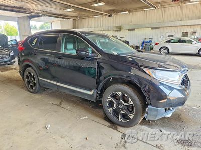 Czwarte zdjęcie samochodu z boku: 2019 HONDA CR-V TOURING VIN:2HKRW2H96KH654902 - miniatura