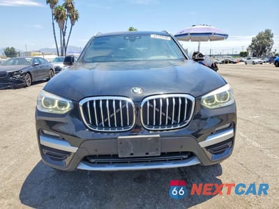 Piąte zdjęcie samochodu w środku: 2020 BMW X3 XDRIVE30I VIN:5UXTY5C01L9B46052 - miniatura