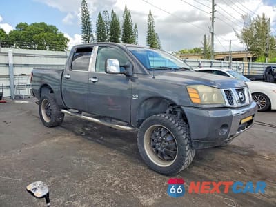 Czwarte zdjęcie samochodu z boku: 2004 NISSAN TITAN XE VIN:1N6AA07BX4N525050 - miniatura