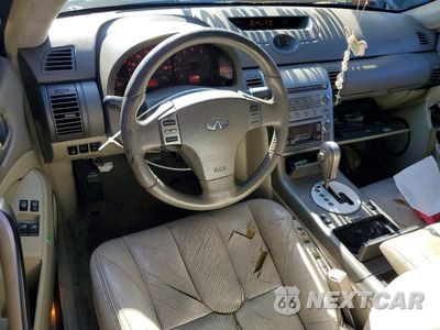 Zdjęcie 8 z 12 samochodu: 2004 INFINITI G35 BASE VIN:JNKCV54E74M304957 - miniatura
