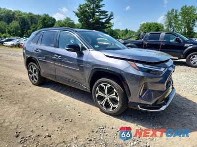 Czwarte zdjęcie samochodu z boku: 2024 TOYOTA RAV4 PRIME XSE VIN:JTMEB3FV0RD229482 - miniatura